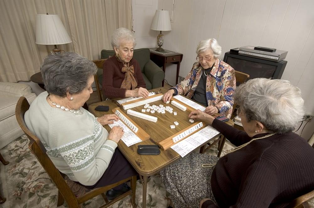 bigstock-Senior-Woman-At-The-Game-Table-1143562